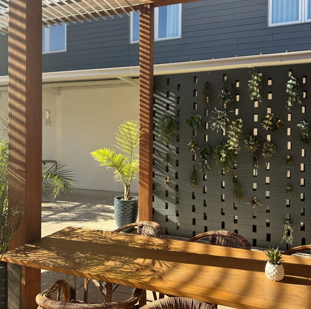 Outside seating area at the ground level pool at the East Austin Hotel
