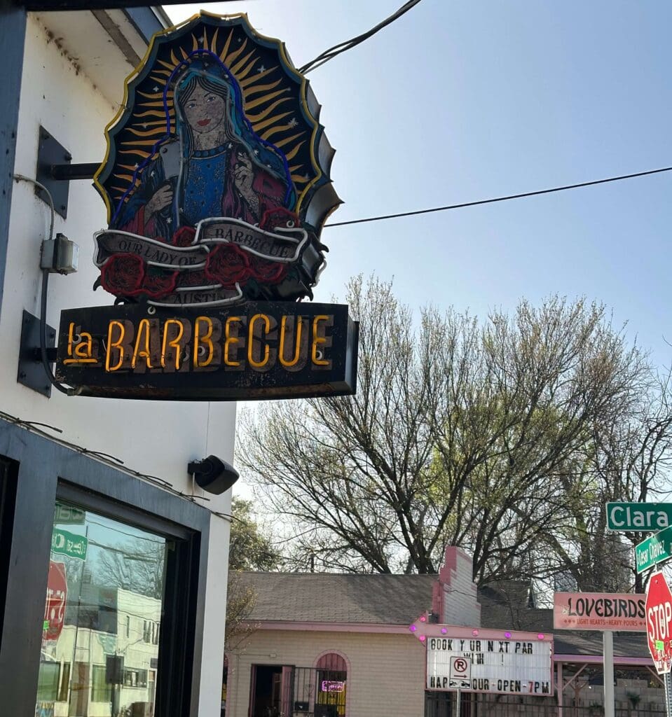 Neon sign outside of la barbecue restaurant 